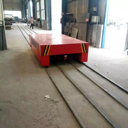 Material transfer trolley—Low pressure rail transfer car